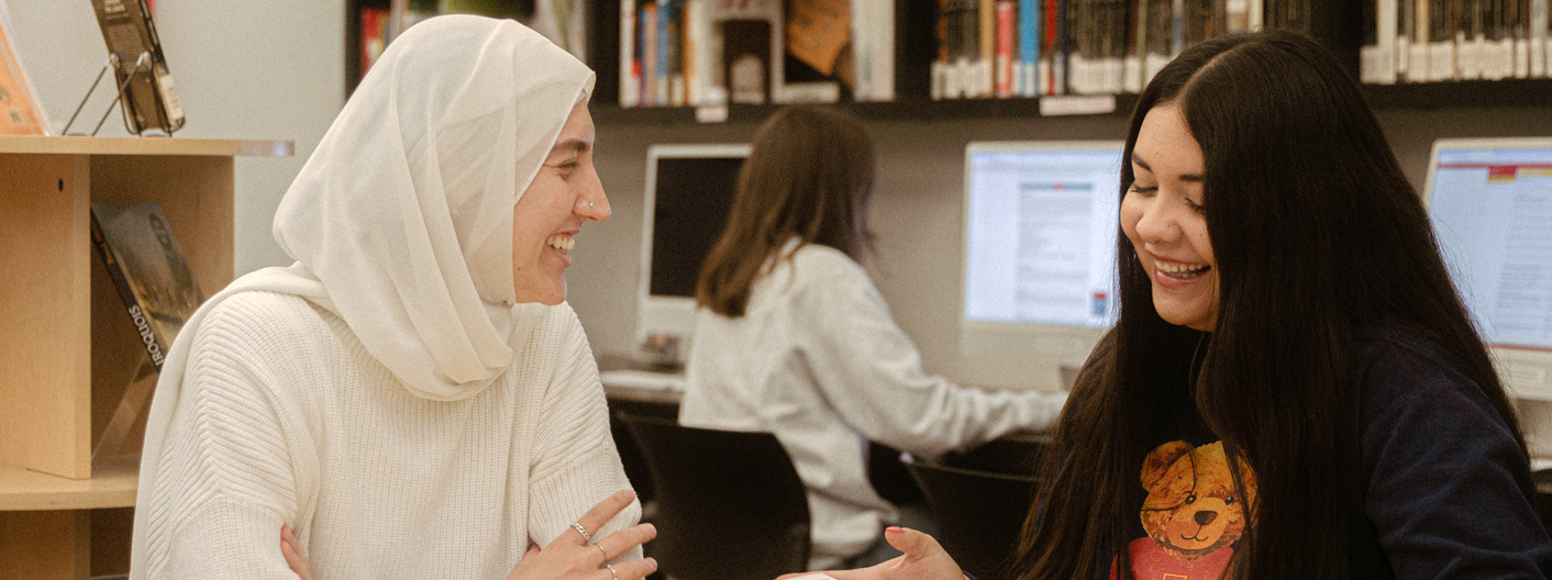 two students study together in the labguage resource center